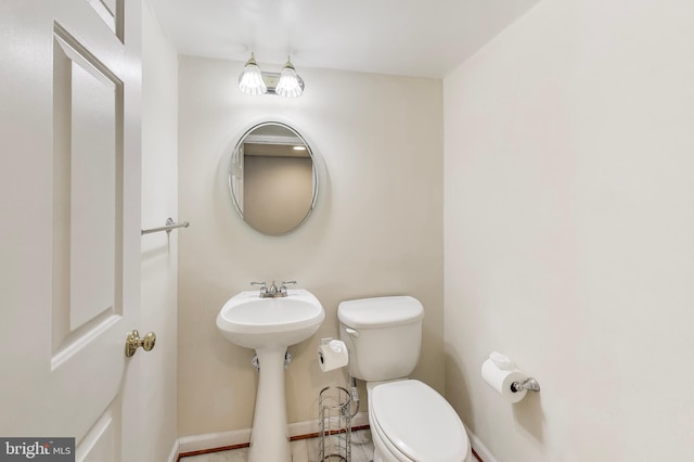 9093 Acheson Ct, Lorton, VA 22079 - bathroom featuring toilet and baseboards