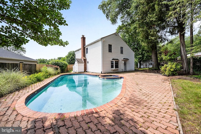 1213 Terrylynn Ct, Herndon, VA 20170 - view of swimming pool featuring a pool with connected hot tub, a fenced backyard, and a patio