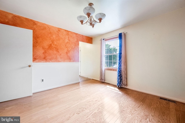 1213 Terrylynn Ct, Herndon, VA 20170 - unfurnished room featuring a chandelier, wood finished floors, and baseboards