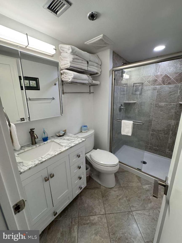 911 Harbour House Rd Unit 911, Bethany Beach, DE 19930 - bathroom with a shower stall, toilet, vanity, and recessed lighting