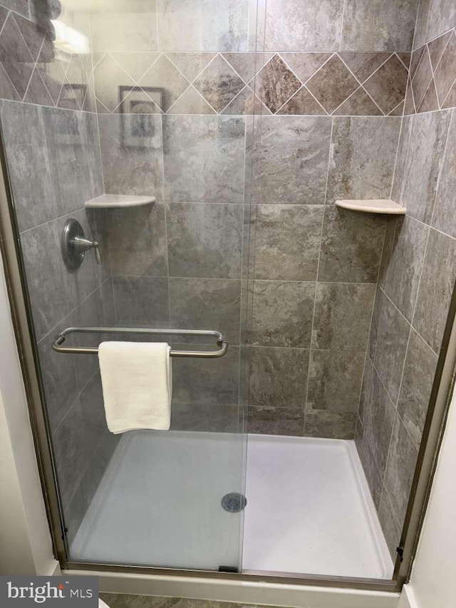 911 Harbour House Rd Unit 911, Bethany Beach, DE 19930 - bathroom featuring a shower stall