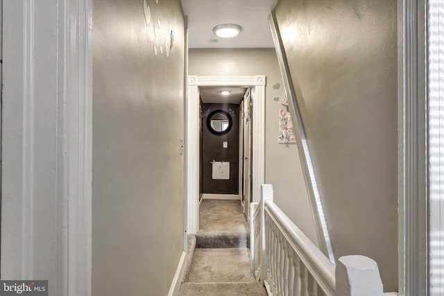 5109 Ivanhoe Ave, Baltimore, MD 21212 - hall with an upstairs landing, carpet flooring, and baseboards