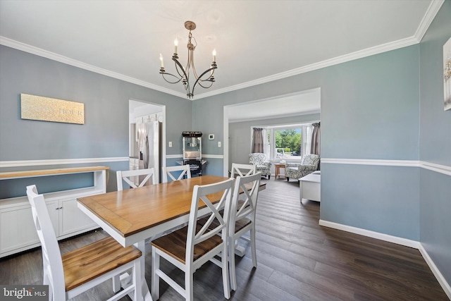 7 Quail Ct, Wilmington, DE 19810 - dining room with a chandelier, crown molding, baseboards, and dark wood finished floors