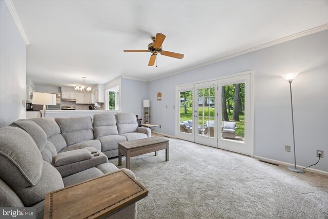 7 Quail Ct, Wilmington, DE 19810 - living room with a chandelier, ornamental molding, light colored carpet, and baseboards
