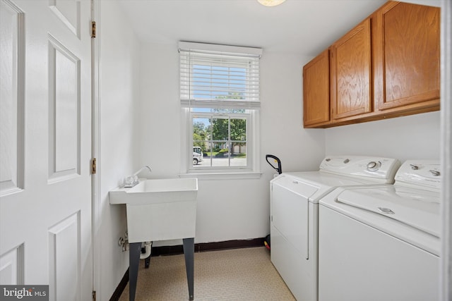 7 Quail Ct, Wilmington, DE 19810 - laundry area with cabinet space, washer and dryer, baseboards, and tile patterned floors