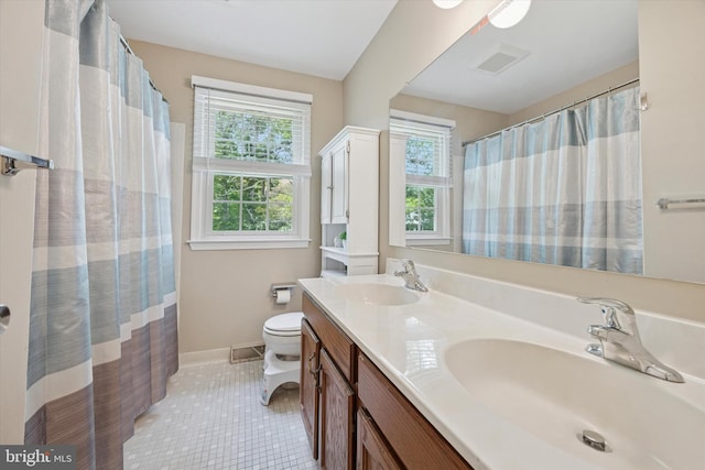 7 Quail Ct, Wilmington, DE 19810 - bathroom featuring toilet, tile patterned floors, double vanity, baseboards, and a shower with curtain