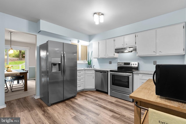 18 Huxley Cir, Abingdon, MD 21009 - kitchen with appliances with stainless steel finishes, under cabinet range hood, light wood-style floors, light countertops, and white cabinets