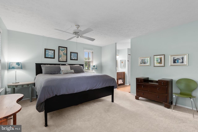 18 Huxley Cir, Abingdon, MD 21009 - bedroom with carpet flooring, a textured ceiling, a ceiling fan, ensuite bath, and baseboards