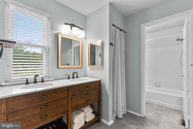 18 Huxley Cir, Abingdon, MD 21009 - bathroom with shower / tub combo with curtain, double vanity, and baseboards