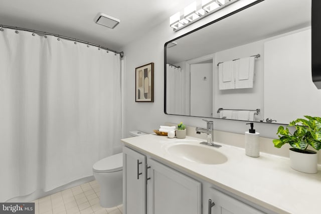 1001 N Randolph St Unit 910, Arlington, VA 22201 - bathroom with toilet, vanity, tile patterned floors, and curtained shower