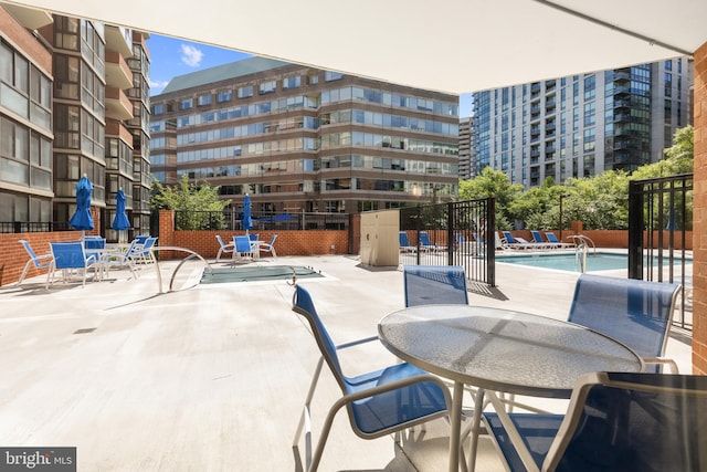 1001 N Randolph St Unit 910, Arlington, VA 22201 - view of patio featuring a community pool