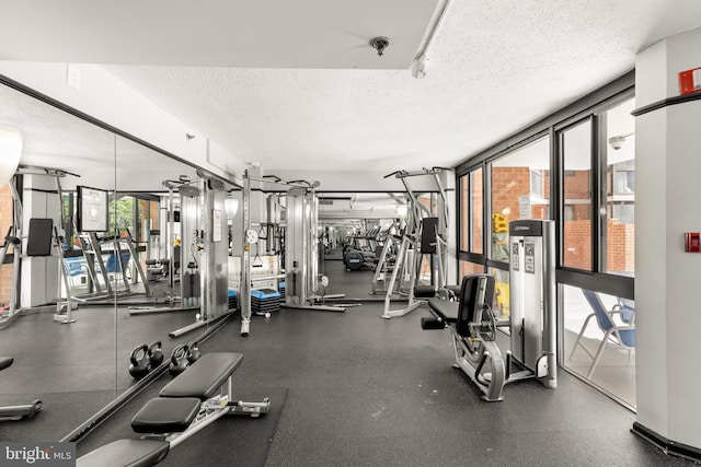 1001 N Randolph St Unit 910, Arlington, VA 22201 - gym featuring a textured ceiling