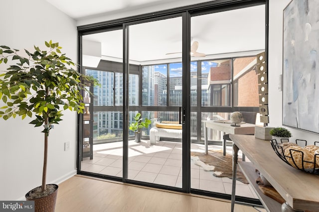 1001 N Randolph St Unit 910, Arlington, VA 22201 - entryway with expansive windows, wood finished floors, and a city view