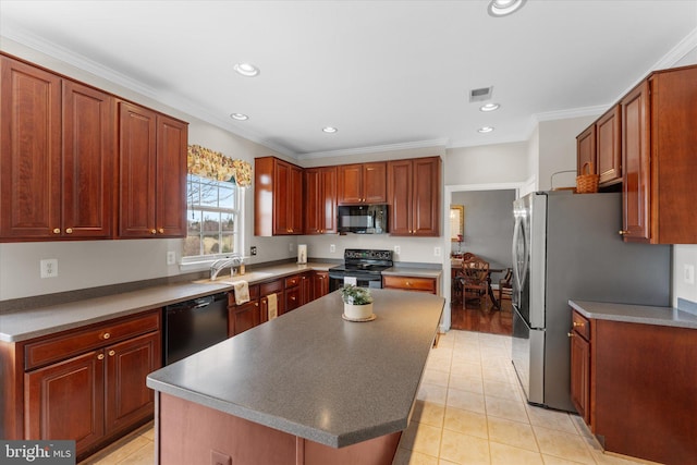 kitchen with black appliances, a kitchen island, ornamental molding, recessed lighting, and a sink