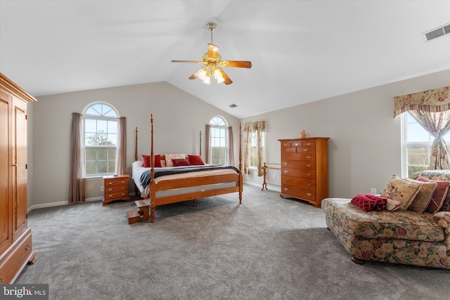 carpeted bedroom featuring vaulted ceiling, a ceiling fan, and baseboards