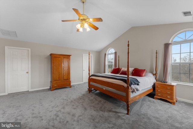 bedroom with lofted ceiling, light colored carpet, baseboards, and a ceiling fan