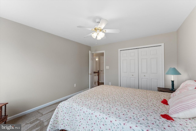 bedroom with light carpet, a closet, baseboards, and a ceiling fan
