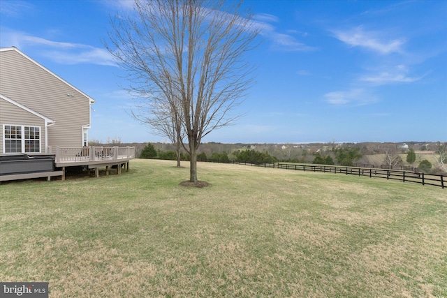 view of yard with a deck
