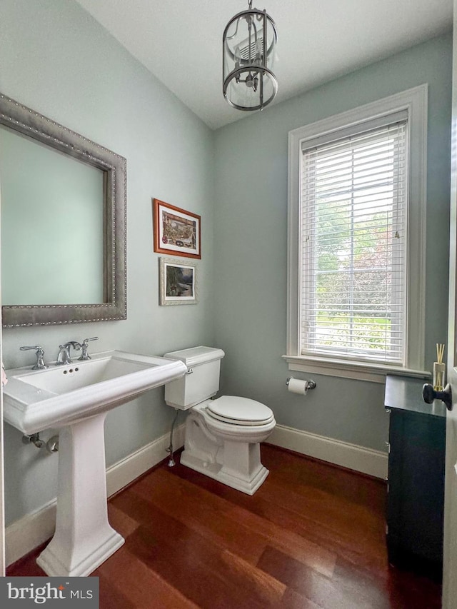 8 Fallbrook Ln, Glen Mills, PA 19342 - bathroom featuring baseboards, wood finished floors, healthy amount of natural light, and a chandelier