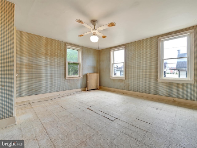 45 Front St, Lititz, PA 17543 - spare room featuring radiator heating unit, ceiling fan, and baseboards