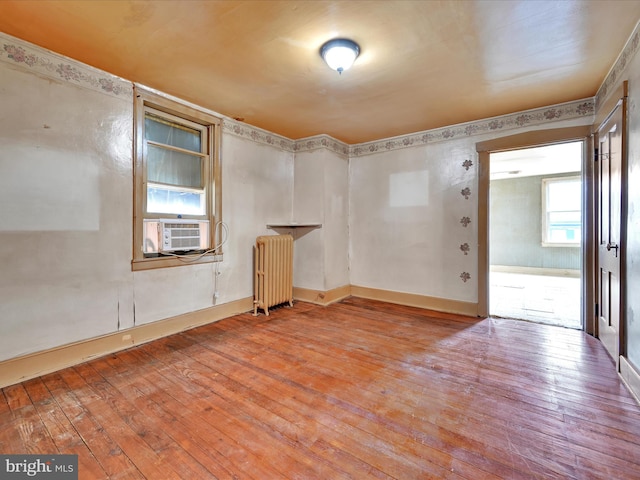 45 Front St, Lititz, PA 17543 - unfurnished room with radiator, light wood-type flooring, and cooling unit