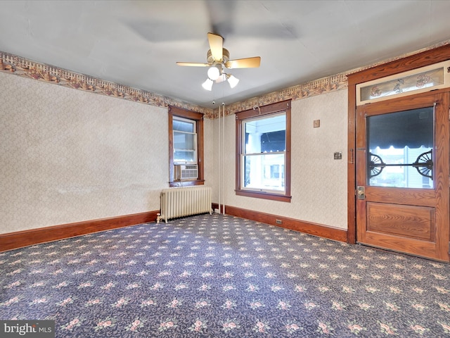 45 Front St, Lititz, PA 17543 - carpeted foyer entrance with radiator, ceiling fan, baseboards, cooling unit, and wallpapered walls