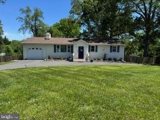 8313 Accotink Rd, Lorton, VA 22079 - ranch-style home featuring an attached garage and concrete driveway