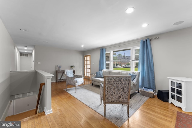 8313 Accotink Rd, Lorton, VA 22079 - living area featuring light wood-style flooring, recessed lighting, and baseboards