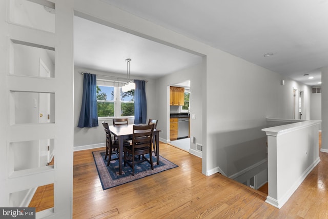 8313 Accotink Rd, Lorton, VA 22079 - dining space featuring light wood finished floors, baseboards, and recessed lighting