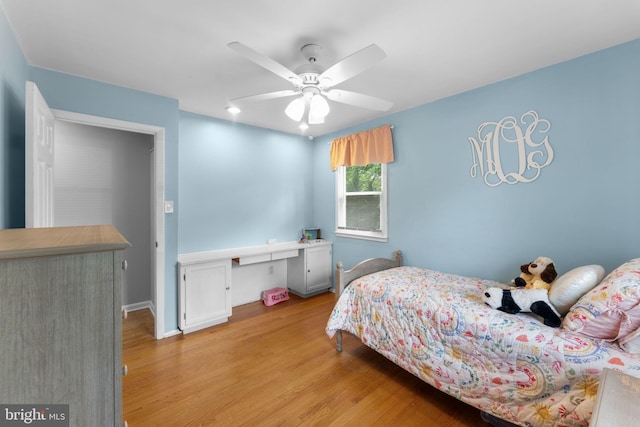 8313 Accotink Rd, Lorton, VA 22079 - bedroom featuring wood finished floors, ceiling fan, and baseboards