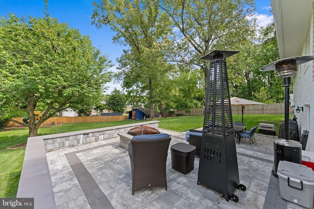 8313 Accotink Rd, Lorton, VA 22079 - view of patio with an outdoor fire pit