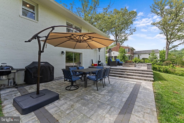 8313 Accotink Rd, Lorton, VA 22079 - view of patio featuring grilling area and outdoor dining space