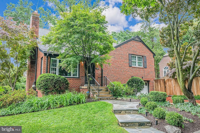 600 Saint Andrews Ln, Silver Spring, MD 20901 - view of front of home with brick siding and a chimney