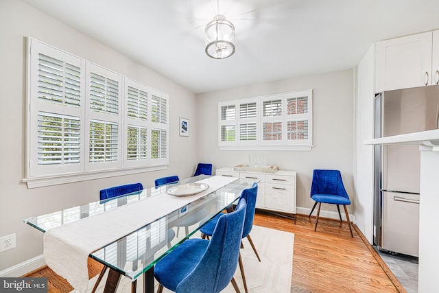 600 Saint Andrews Ln, Silver Spring, MD 20901 - dining space featuring light wood finished floors and baseboards