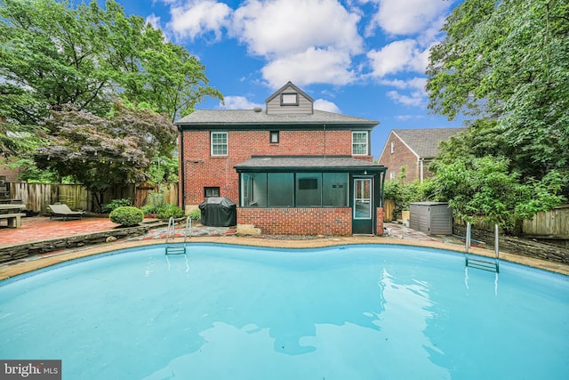 600 Saint Andrews Ln, Silver Spring, MD 20901 - view of swimming pool with a fenced backyard, a sunroom, and area for grilling