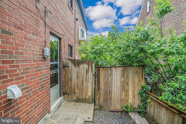 600 Saint Andrews Ln, Silver Spring, MD 20901 - view of home's exterior with a gate and brick siding