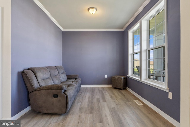 430 Mcwharton Way, Bunker Hill, WV 25413 - unfurnished room featuring plenty of natural light, crown molding, wood finished floors, and baseboards