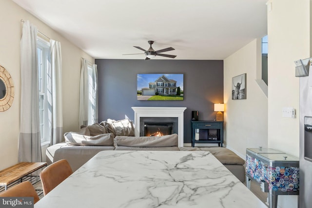 430 Mcwharton Way, Bunker Hill, WV 25413 - bedroom featuring a glass covered fireplace, ceiling fan, and baseboards