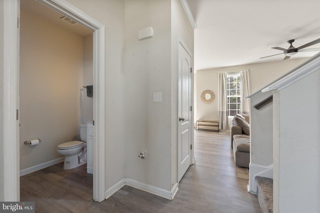 430 Mcwharton Way, Bunker Hill, WV 25413 - hall featuring wood finished floors, baseboards, and stairway