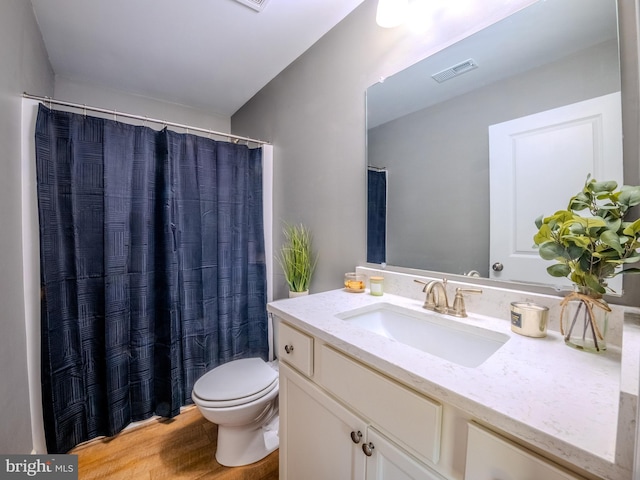 107 Arbutis Trl, Star Tannery, VA 22654 - bathroom with vanity, toilet, and wood finished floors