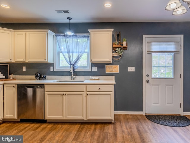 107 Arbutis Trl, Star Tannery, VA 22654 - kitchen featuring stainless steel dishwasher, a sink, light wood-style flooring, healthy amount of natural light, and recessed lighting