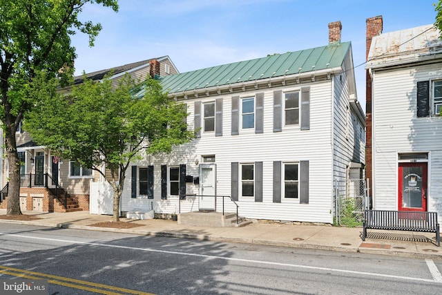 707 S Braddock St, Winchester, VA 22601 - view of front of property with metal roof, a standing seam roof, and a chimney