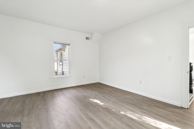 707 S Braddock St, Winchester, VA 22601 - unfurnished room featuring wood finished floors and baseboards