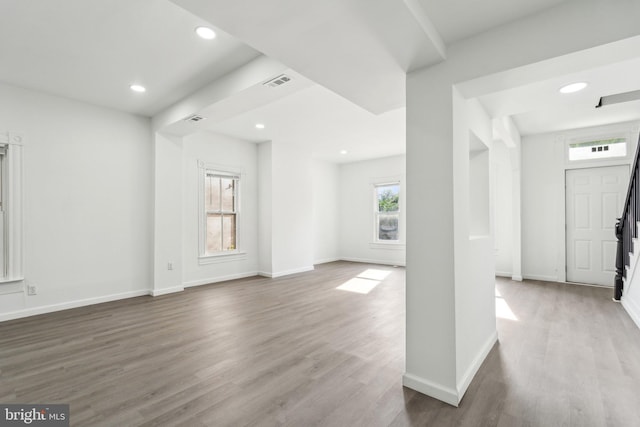 707 S Braddock St, Winchester, VA 22601 - unfurnished living room with wood finished floors, baseboards, and recessed lighting