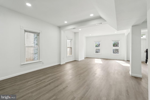707 S Braddock St, Winchester, VA 22601 - unfurnished living room with recessed lighting, wood finished floors, and baseboards