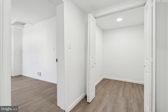 707 S Braddock St, Winchester, VA 22601 - hall featuring wood finished floors, baseboards, and recessed lighting