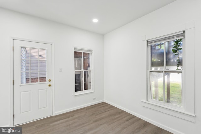 707 S Braddock St, Winchester, VA 22601 - unfurnished room featuring wood finished floors, plenty of natural light, baseboards, and recessed lighting