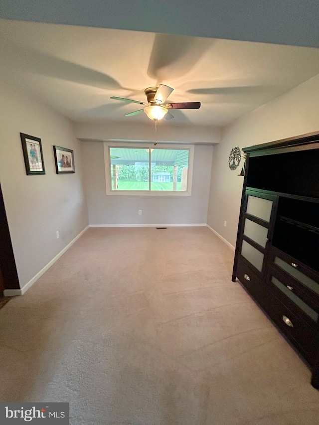 3603 Regency Dr, Reading, PA 19608 - unfurnished bedroom featuring light colored carpet, baseboards, and a ceiling fan