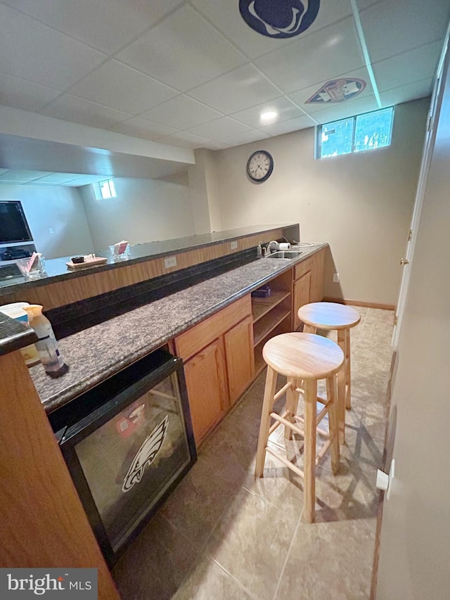 3603 Regency Dr, Reading, PA 19608 - indoor dry bar featuring a paneled ceiling and light tile patterned floors