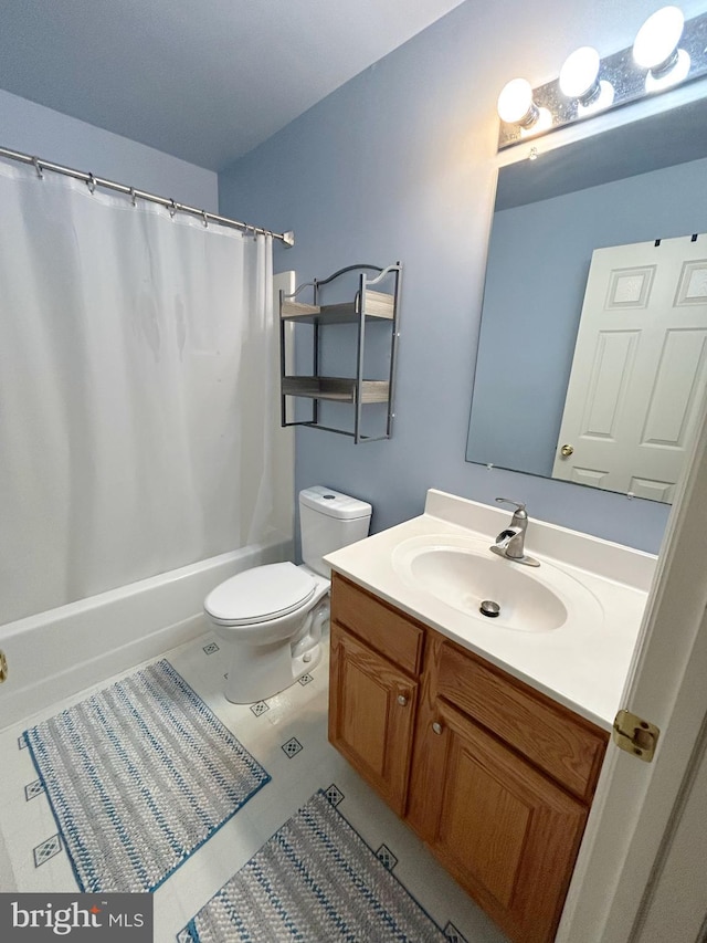 3603 Regency Dr, Reading, PA 19608 - full bathroom featuring vanity, toilet, shower / bath combo, and tile patterned floors